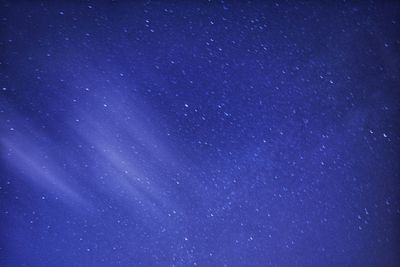 Low angle view of stars in sky at night