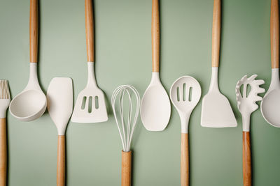 High angle view of spoons on white background