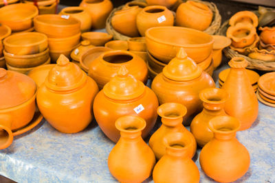 High angle view of various clay pots for sale at market stall