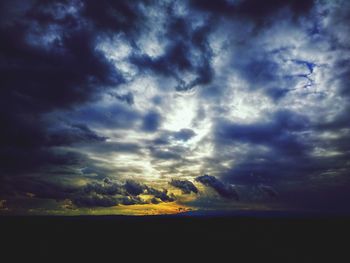 Scenic view of dramatic sky over sea