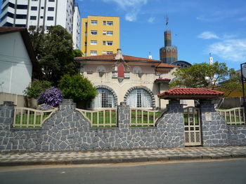 Exterior of buildings against sky in city