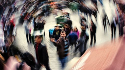 Group of people on street in city