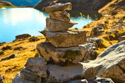 Stack of rocks in lake