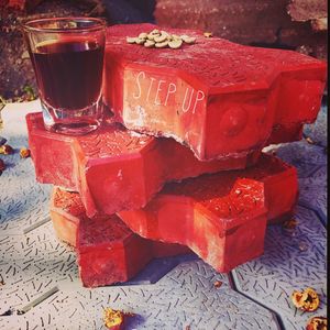 High angle view of red wine on table