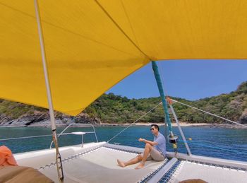 High angle view of young man in yacht 