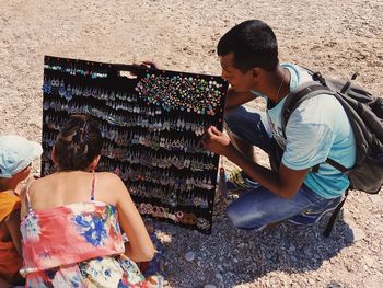 Rear view of couple standing outdoors