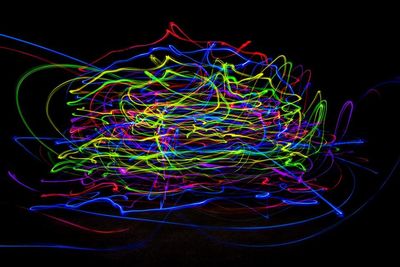 Light painting against black background