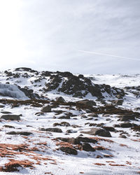 Snow covered mountain against sky