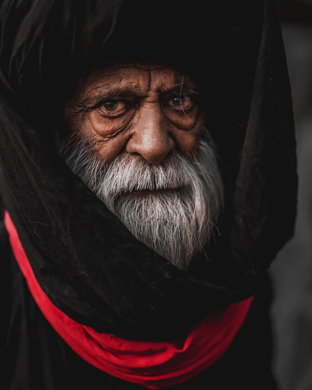 facial hair, portrait, beard, front view, males, real people, looking at camera, people, men, clothing, adult, senior adult, lifestyles, hat, close-up, senior men, red, mature adult, mature men, human face, hood - clothing