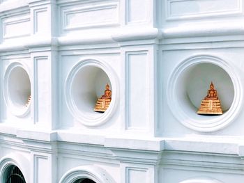 Low angle view of white window of historic building