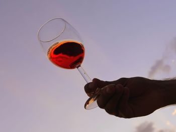 Close-up of hand holding drink