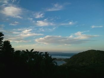 Scenic view of sea against cloudy sky