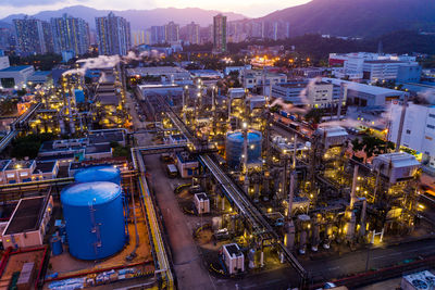 High angle view of illuminated buildings at night