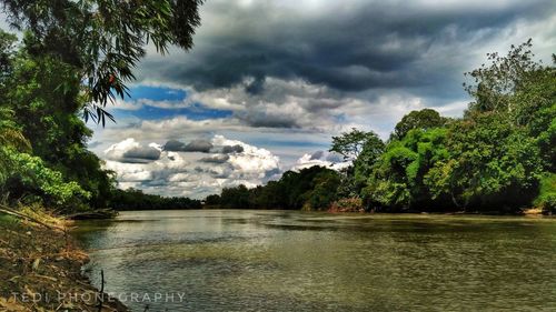 Scenic view of river against sky