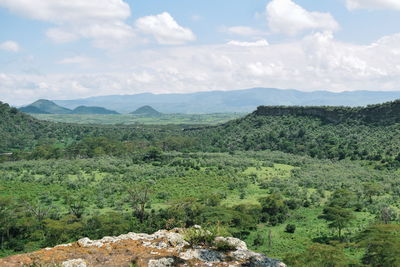 Crater lake against a panoramic mountain landscapes of naivasha, rift valley, kenya