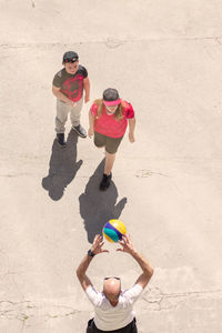 High angle view of people enjoying on land