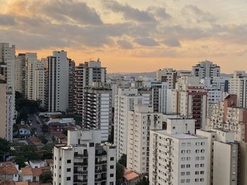 High angle view of buildings against sky during sunset