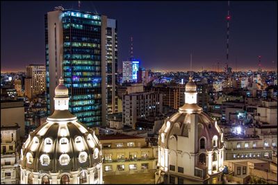 Illuminated cityscape at night