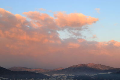 Scenic view of mountains against sky during sunset