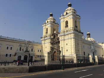 Low angle view of buildings against clear sky