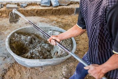 High angle view of man preparing food