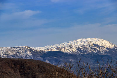 Snowcapped mountains against sky