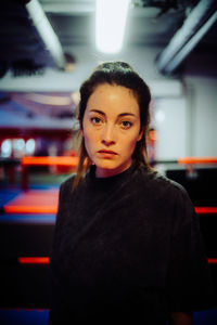 Portrait of young woman looking away