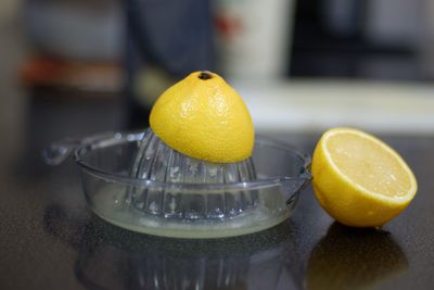 Close-up of oranges on table