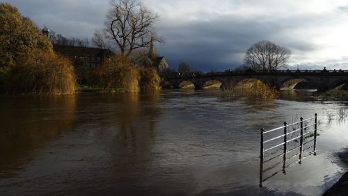 Bridge over river against sky