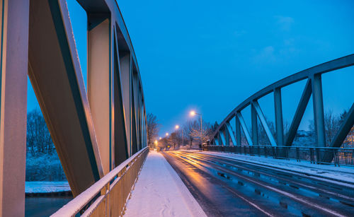 Panoramic view of bridge in city during winter