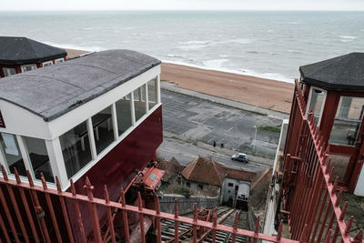 High angle view of city by sea