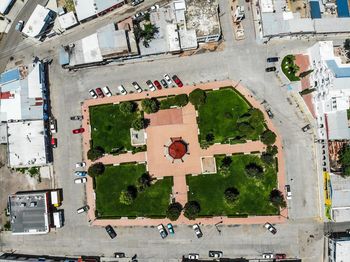 High angle view of road by building in city