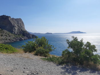 Scenic view of sea against clear blue sky