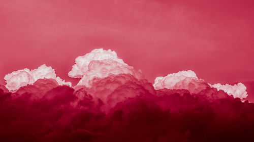Close-up of frozen water against sky