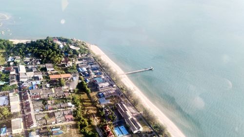 High angle view of city by sea