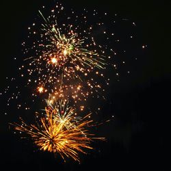 Firework display at night