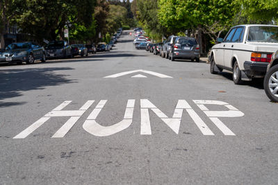 Road sign on street in city