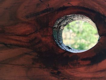 Low angle view of hole in tunnel