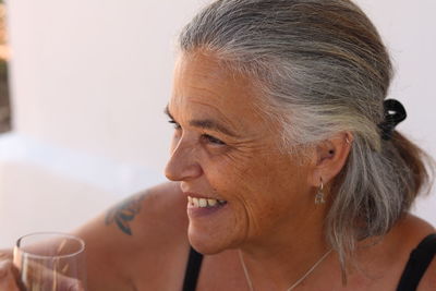 Close-up of smiling mid adult woman