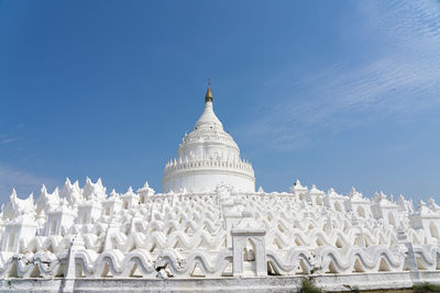 Low angle view of building against blue sky