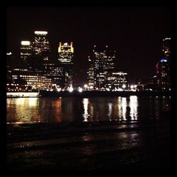 Skyscrapers in city at night