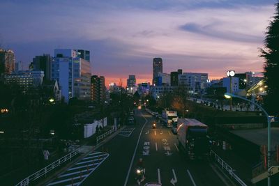 High angle view of road against sky in city at dusk