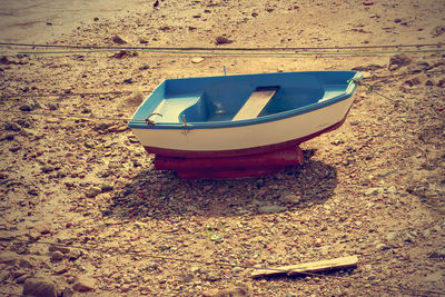 High angle view of boat moored on shore