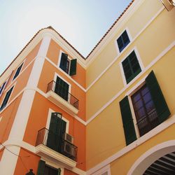 Low angle view of residential building against sky
