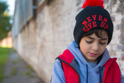 Portrait of little boy wearing hat