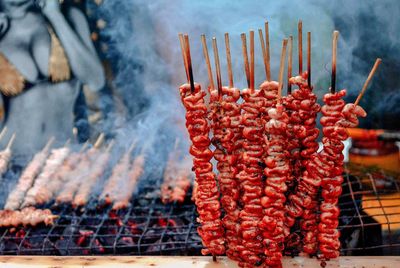 Close-up of meat on barbecue grill