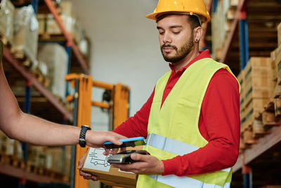 Portrait of man working in factory