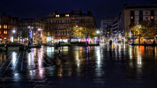 View of illuminated city at night