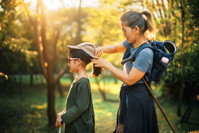 Mother and son on land