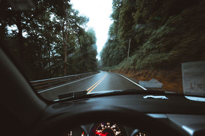 Road seen through car windshield